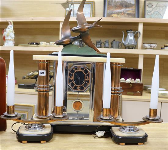 An Art Deco French clock garniture, Odeon style